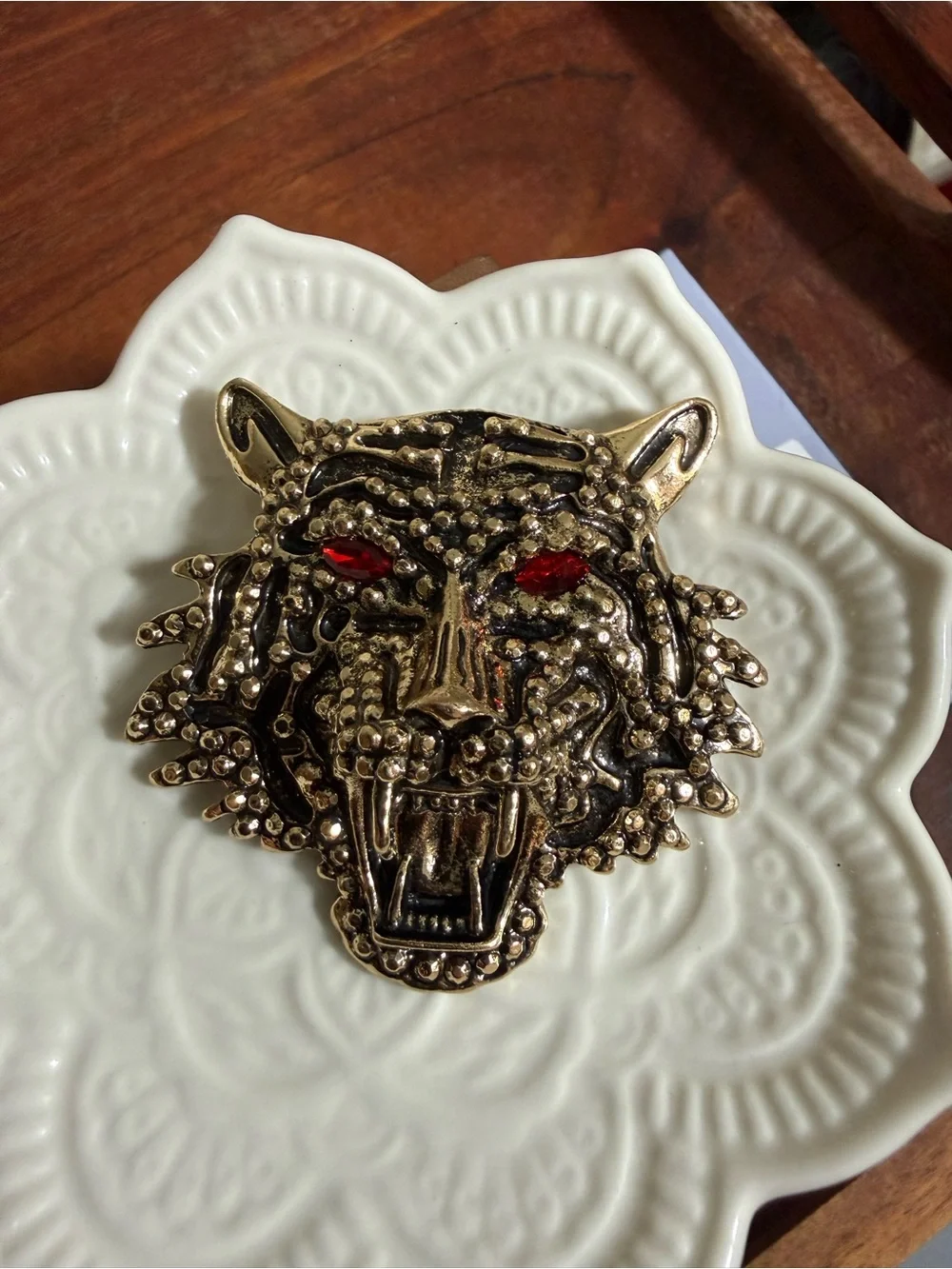 gold-tone metal roaring tiger head brooch red rhinestone eyes textured detail